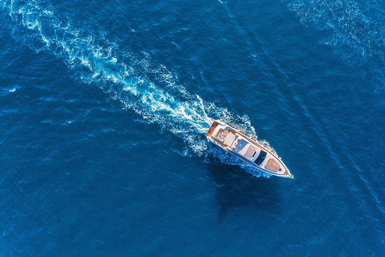Boat on open water showing the freedom when properly covered
